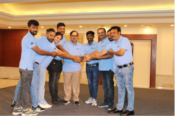 A group of people in blue shirts
AI-generated content may be incorrect.